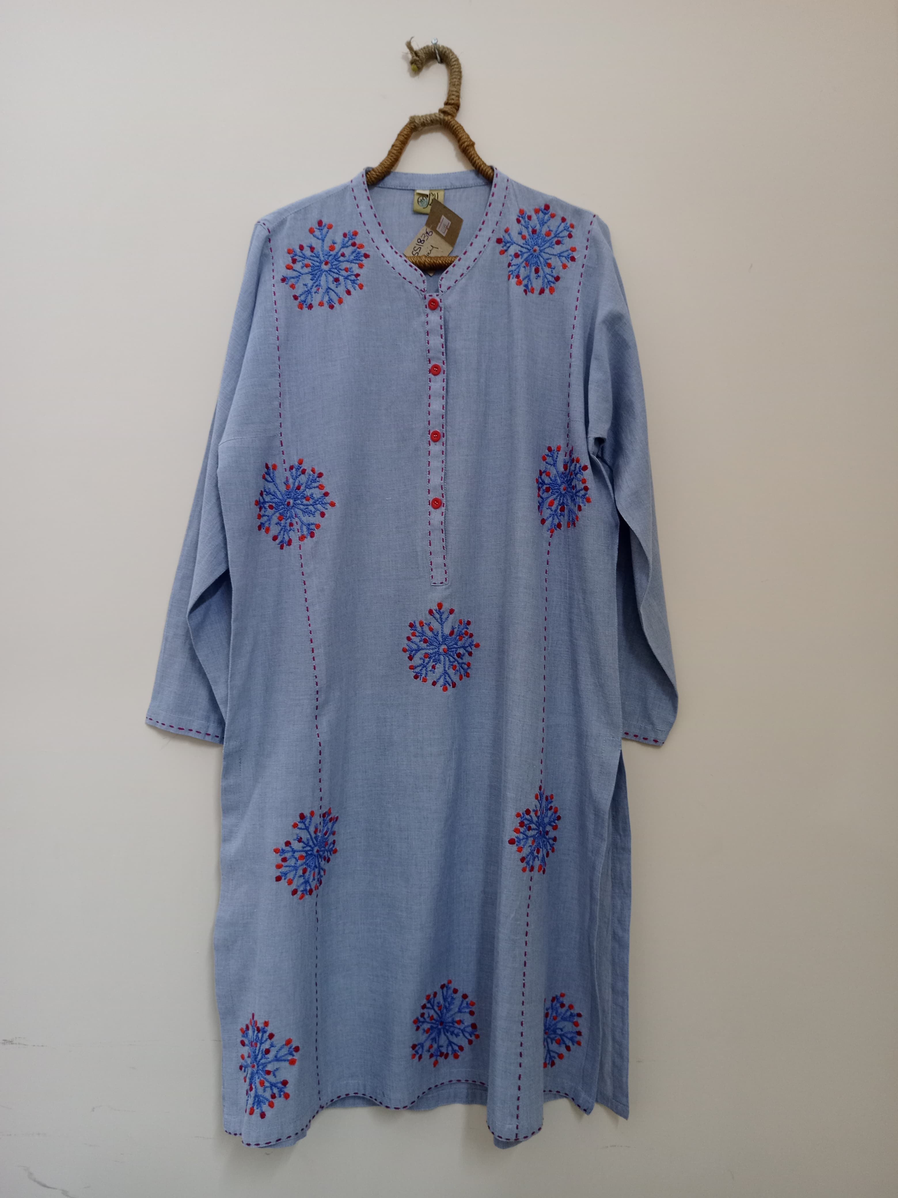 Elegant cotton shirt with delicate hand embroidery – soft, breathable, and timeless.